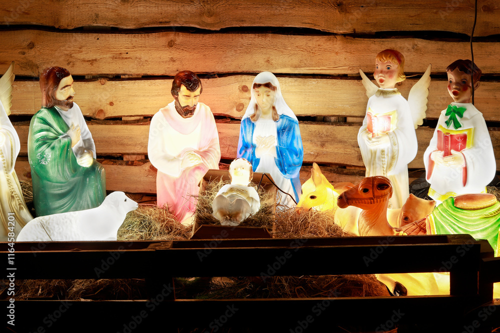 ROKICINY PODHALANSKIE, POLAND - DECEMBER 29, 2024: Traditional Christmas decorations, nativity scene by the church in Rokiciny Podhalanskie.