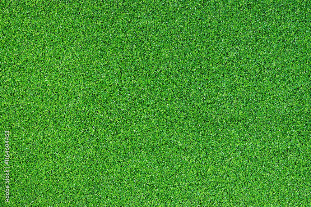 Artificial grass, covering. Artificial green grass mat, top view. Texture. Background. Artificial turf, surface made of synthetic fibers. Flat green grass texture background. Short grass