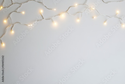 Soft glowing fairy lights on a plain white background, perfect for holiday, celebration, or cozy home decor themes.