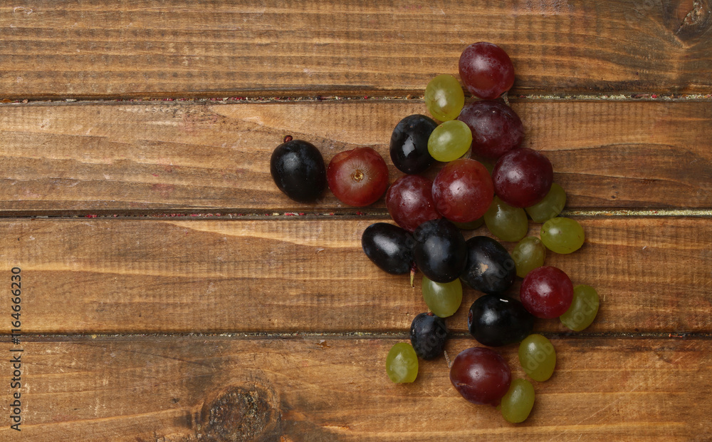 bunch of grapes on a rustic background bunch of grapes on a rustic background