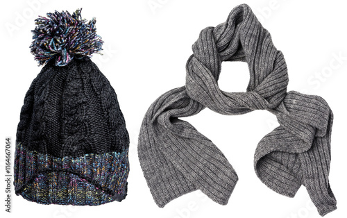 Knitted wool gray hat with pompom and long scarf on isolated background photo