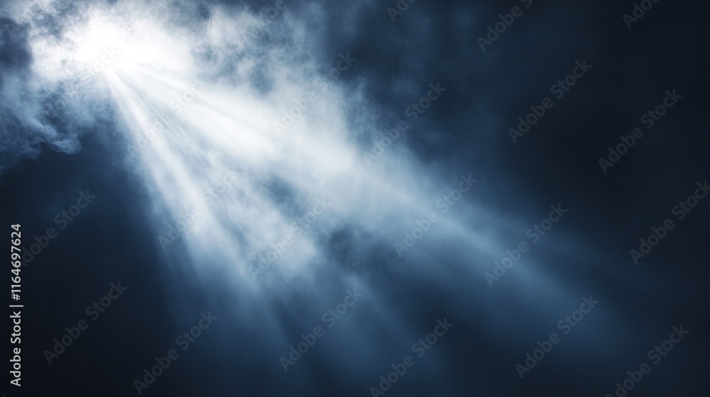 Fototapeta premium Light beams shining through dark clouds.