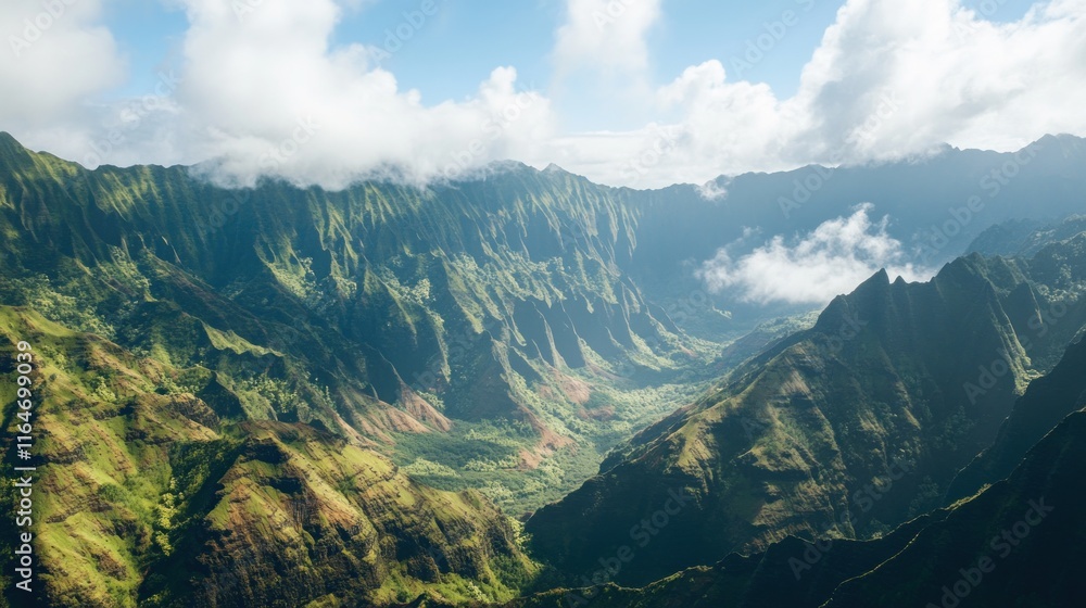 Lush green mountains and valleys with clouds under a bright sky.