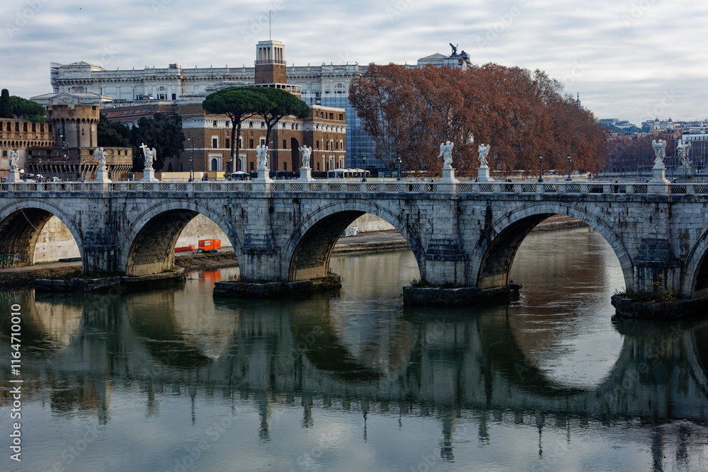 Rome Italy Scenic view of Ponte Vittorio Emanuele II with reflection on the calm Tiber River surrounded by historic architecture vibrant winter colors and details capturing Roman heritage tourism
