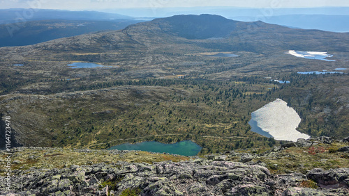 Hiking a mountain with strangely shaped rocks, Rundemellin, Norway photo