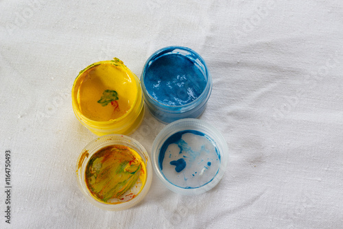 mixed colors in gouache jars photo