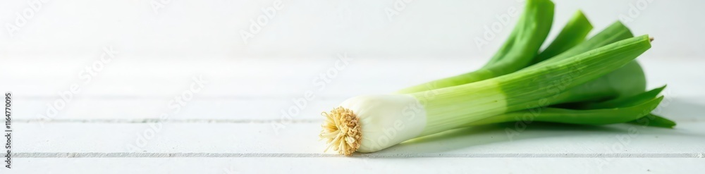 Fresh leek on a plain white surface with slight texture, vegetable, minimalist Fresh leek on a plain white surface with slight texture, vegetable, minimalist