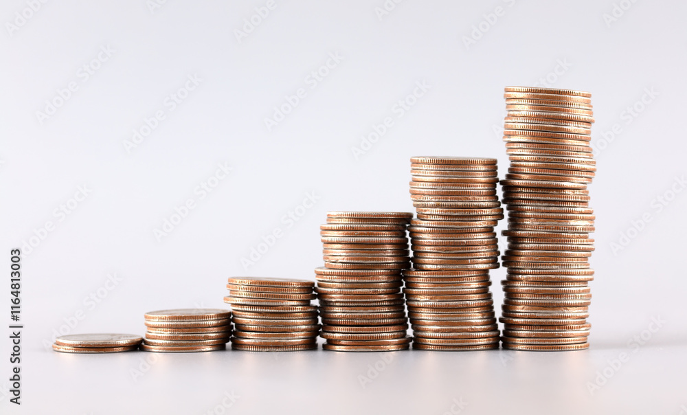 Incremental dollar coins on a gray background Incremental dollar coins on a gray background