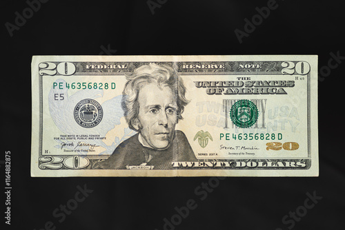 The front of a twenty dollar bill