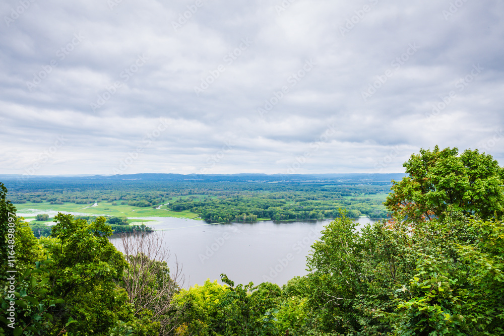 Scenic overlook from the Great River Bluffs State Park in Minnesota preserves steep-sided bluffs between Minnesota and Wisconsin. Scenic overlook from the Great River Bluffs State Park in Minnesota preserves steep-sided bluffs between Minnesota and Wisconsin.