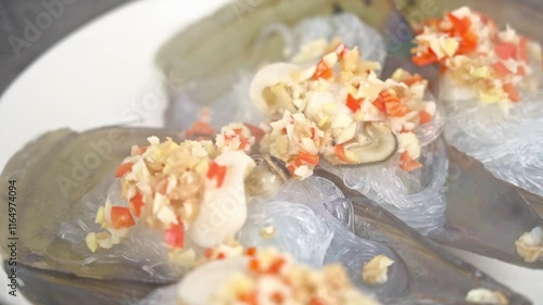 A plate of ginger  scallions scallops with vermicelli