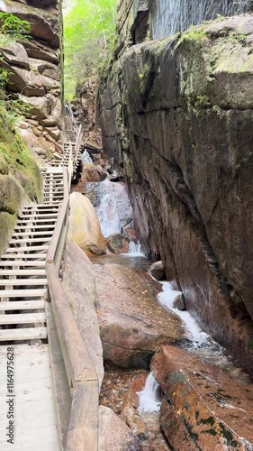 wooden walkway and path in the canyon of Flume Gorge in the Franconia Notch State Park, New Hampshire