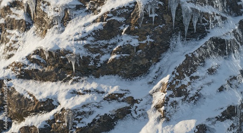 Snowy mountain rock texture with ice and snow accumulation