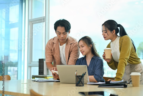 Modern business startup team brainstorming ideas during a work session in co working space