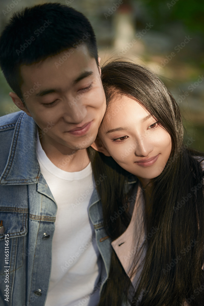 Fototapeta premium Loving young couple outdoors at sunset