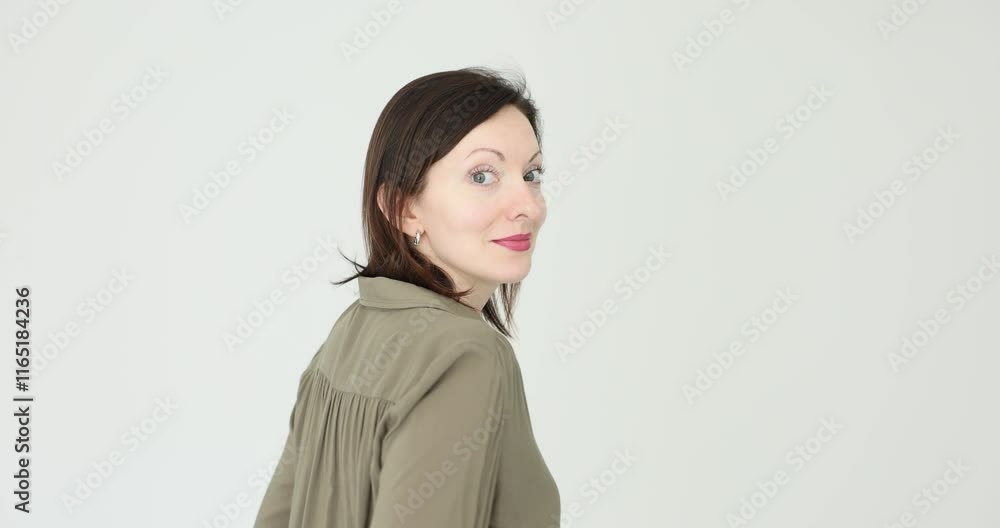 Woman is playfully gesturing and calling to follow Woman is playfully gesturing and calling to follow