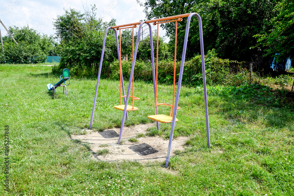 Children's playground. Swing, carousel and slide Children's playground. Swing, carousel and slide