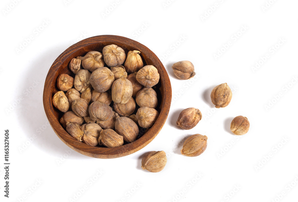 A bunch of cardamom (kapulaga) seeds isolated on a white background. In addition to being a flavor enhancer, cardamom is also used as a medicine for coughs, itchy throats, stomach aches, bloating. A bunch of cardamom (kapulaga) seeds isolated on a white background. In addition to being a flavor enhancer, cardamom is also used as a medicine for coughs, itchy throats, stomach aches, bloating.
