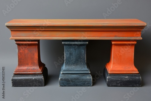 Distressed Wooden Table with Three Colorful Pillars photo