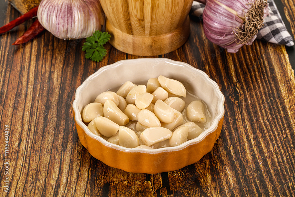 Tasty aroma marinated garlic cloves Tasty aroma marinated garlic cloves