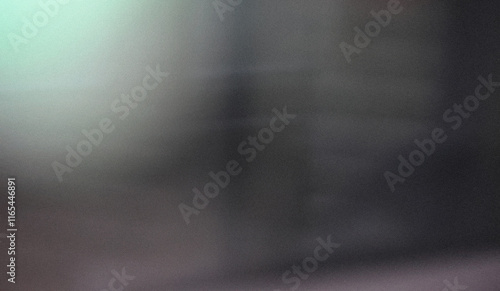 The image is a blurred gradient background. It has a soft, hazy appearance. photo