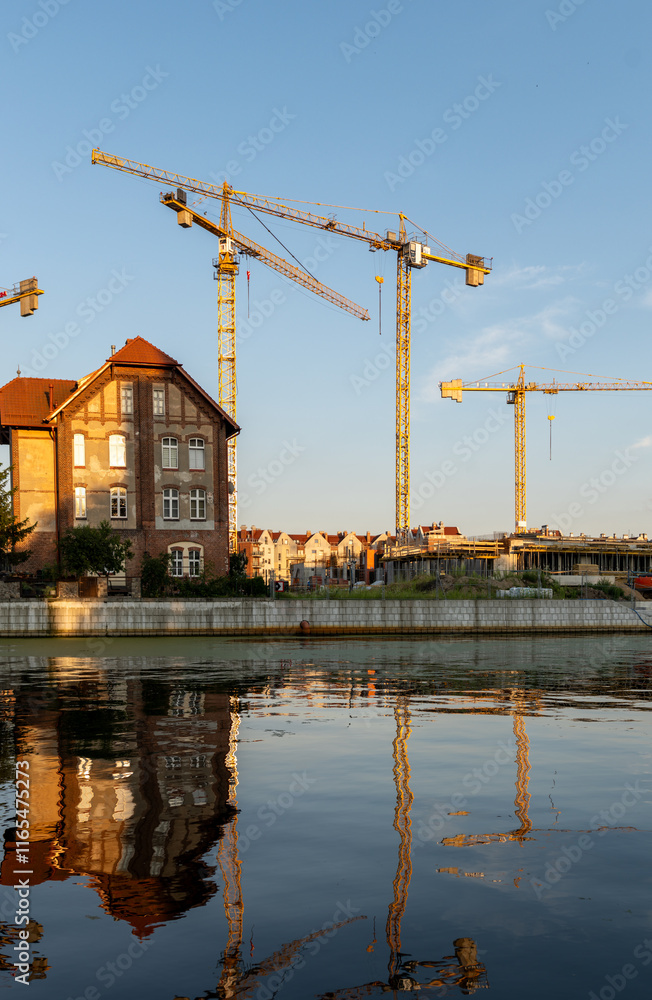 Development and construction works, new buildings as seen from Promenada Bastionami, Gdansk city, Poland in sunny day Development and construction works, new buildings as seen from Promenada Bastionami, Gdansk city, Poland in sunny day