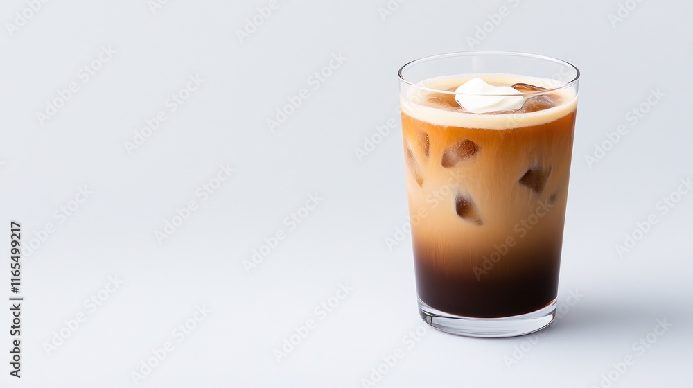 A refreshing glass of iced coffee with cream on top. A refreshing glass of iced coffee with cream on top.