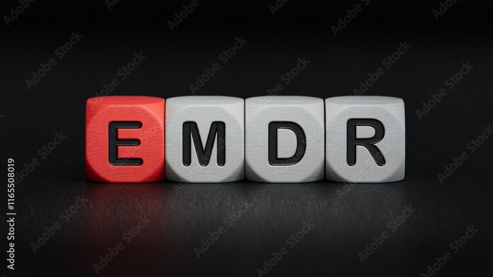 Fototapeta premium The text EMDR word Eye Movement Desensitization is written on notepad . Medical concept.close up of wooden elements,Business Concept.3D rendering on black background.