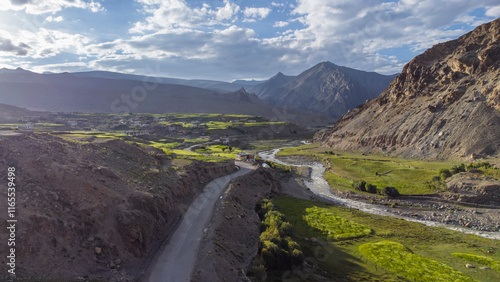 An aerial view of himalayan mountains at gya village in the Leh district of Ladakh between the Indus river valley and Tanglang La Pass on the leh-manali highway in India. photo