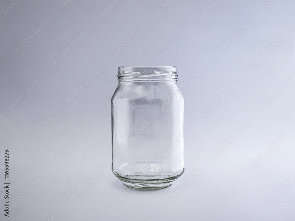 Empty transparent glass jar isolated on a white background
Empty transparent glass jar isolated on a white background