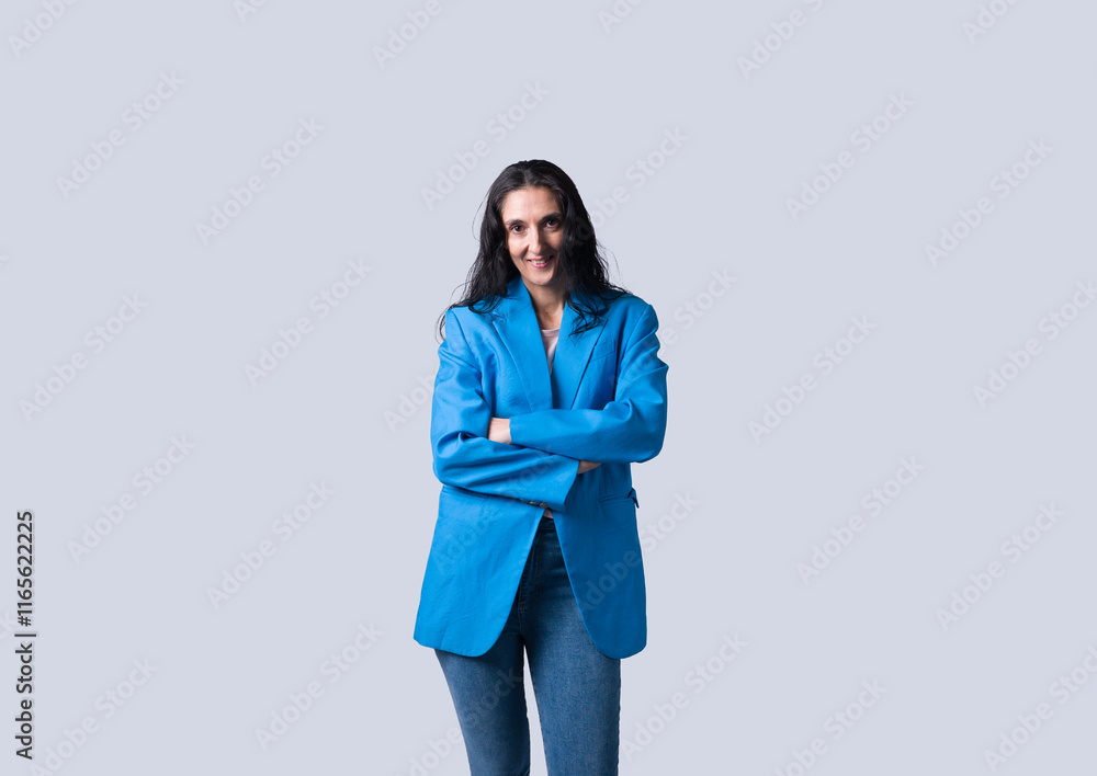 Confident caucasian businesswoman in suit isolated on grey background