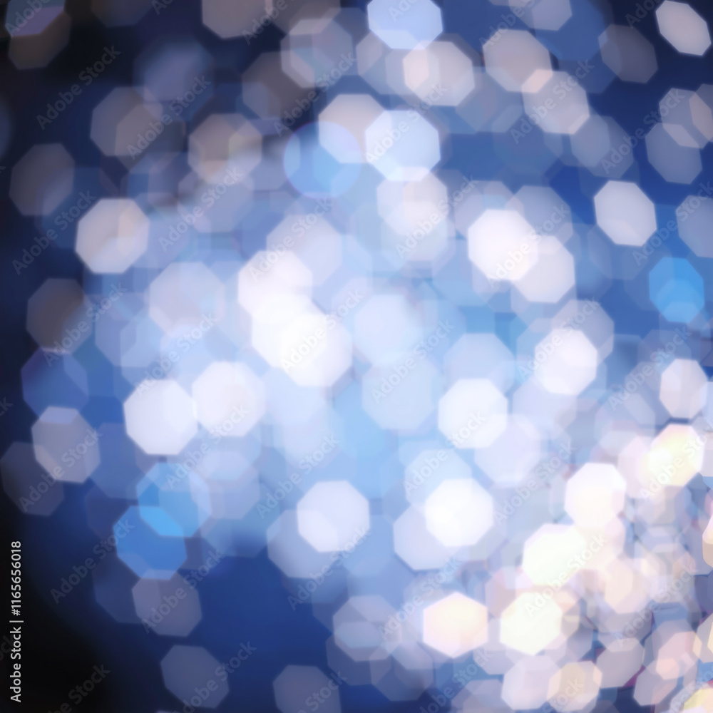 Fototapeta premium Abstract bokeh background with blurred white and yellow lights against a deep blue backdrop, creating a festive and dreamy atmosphere.
