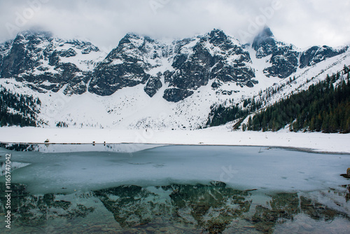 Fototapeta Naklejka Na Ścianę i Meble -  Frozen Lake Morskie Oko or Sea Eye Lake in Poland at Winter.