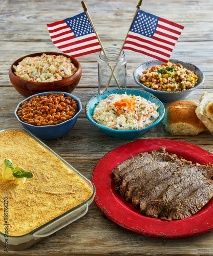 4th of July picnic spread with brisket, coleslaw, baked beans, potato salad, and banana pudding