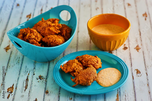Fototapete seafood fritters with a spicy remoulade dipping sauce