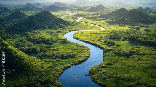 Serene river winding through vibrant green hills in a tranquil landscape duri...