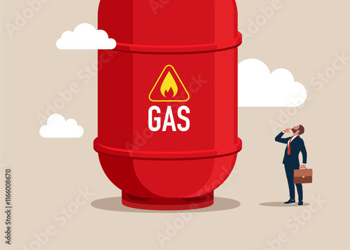 Entrepreneur thinking with big gas cylinder. Think big, aspiration to win and success in business. Commodities price for trading and investment. Gas tank, Used for  various industries, consumable.