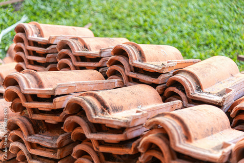 Pile of old clay tiles in a masonry renovation space
