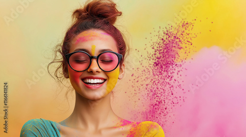 A woman joyfully celebrates Holi, smiling amidst vibrant colors and a festive atmosphere photo