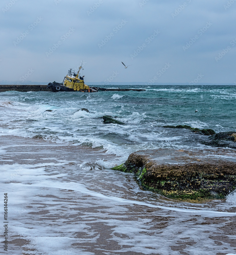The boat ran aground near the shore in the Black Sea. The boat ran aground near the shore in the Black Sea.