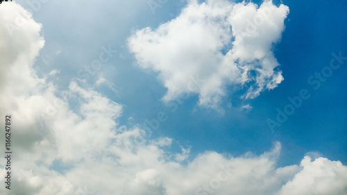 Focus on clouds. The sky was bright blue with pure white clouds like soft cotton. Full frame shot. Clear sky blue sky background photo