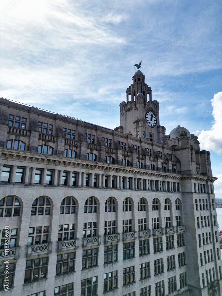 Obraz premium Historical and Modern Central Town Center and Downtown Buildings at British City Centre of Liverpool, Maritime city in northwest England, United Kingdom on Beach and Ocean Docks. May 5th, 2024. 