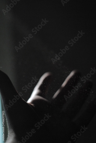 dust flying around hand