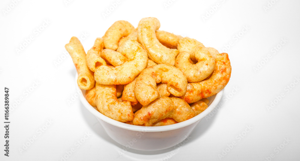 Fried macaroni served in a white bowl isolated on white background. Savory fried macaroni in Indonesia Fried macaroni served in a white bowl isolated on white background. Savory fried macaroni in Indonesia