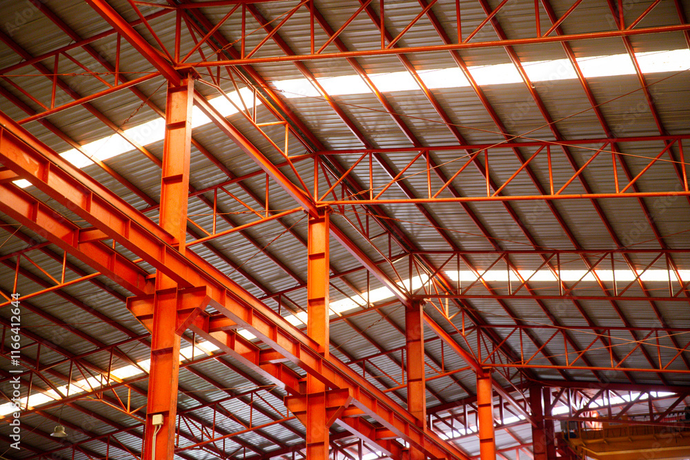 Obraz premium factory indoor steel structure industrial roof construction metal architecture inside interior iron modern large building warehouse.