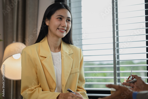 diverse team working together in modern co-working space, business people having casual discussion during meeting, marketing, accounting, finance, Team working ambitiously in an office room. photo