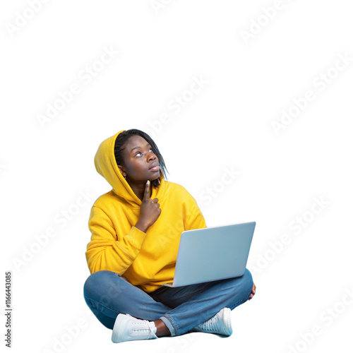Young person, bright yellow hoodie, focused expression, using laptop, white background, casual pose, modern technology, youth culture, digital native, student life, learning online, contemplative mood