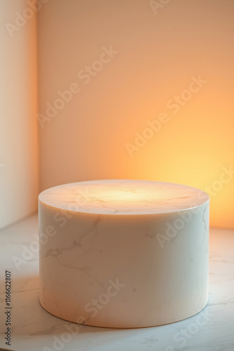 round marble display stand with warm backlighting
