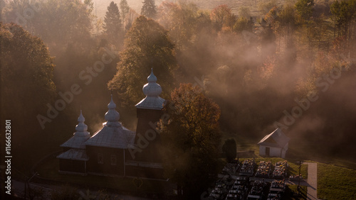 Fototapeta Naklejka Na Ścianę i Meble -  Aerial View of Orthodox Wooden Church in Carpathian Mountains, Poland