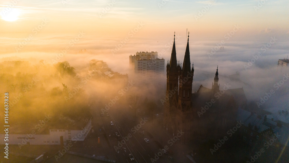 Naklejka premium Serene Foggy Atmosphere Over Tarnow City at Sunset